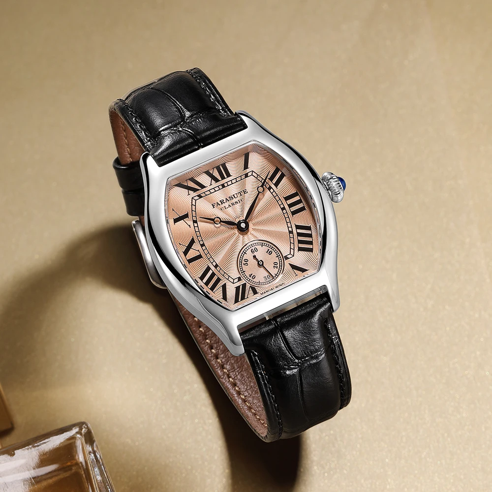 Luxury men's watch with black leather strap and rose gold face.