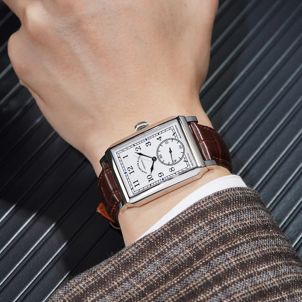Stylish rectangular wristwatch with leather band and silver dial for men.