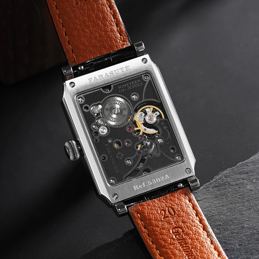 Skeleton watch with leather strap, showcasing intricate mechanical movement and modern design.