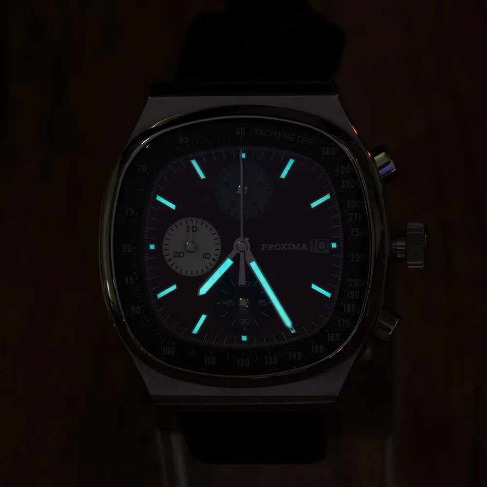 Luminous watch with chronograph and date display, perfect for stylish timekeeping.