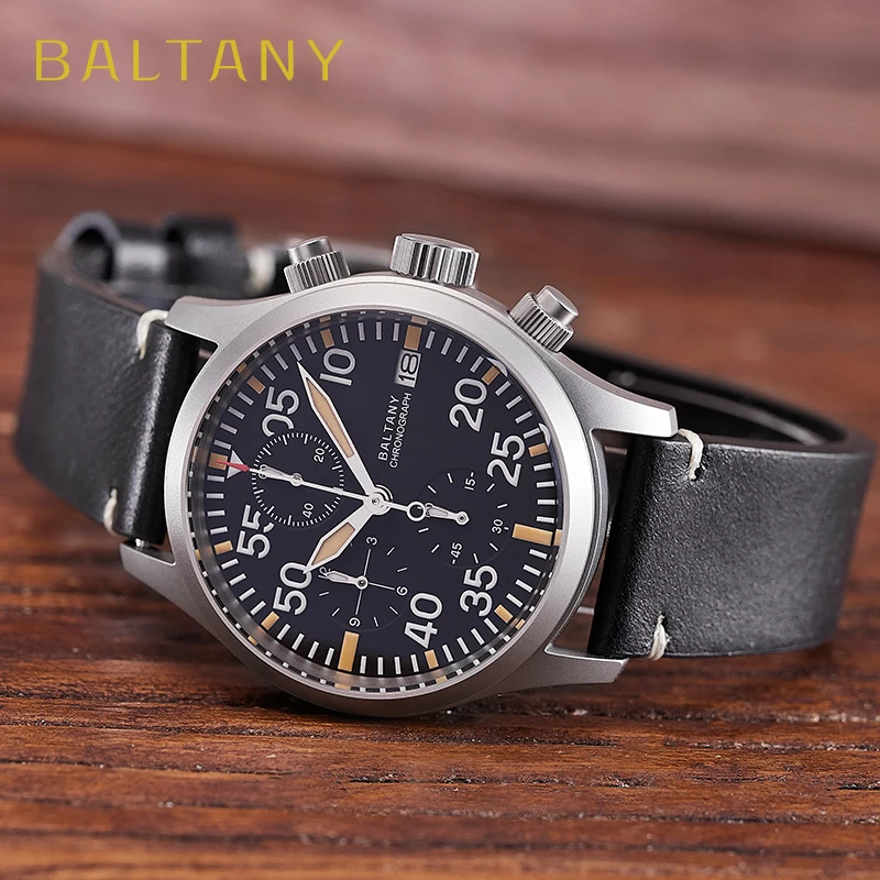Men's black leather strap chronograph watch with stainless steel case.