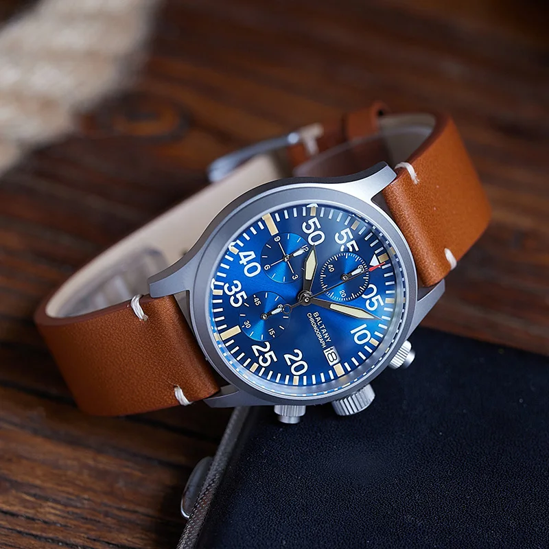 Men's chronograph watch with blue dial and brown leather strap, stylish and functional accessory.