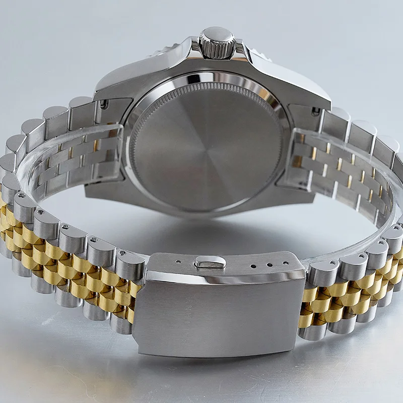 Elegant two-tone stainless steel watch with silver and gold accents.