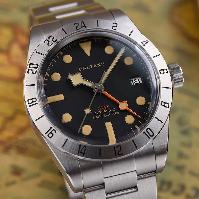 Vintage Baltic GMT automatic dive watch with stainless steel band and black dial. Features date disp.
