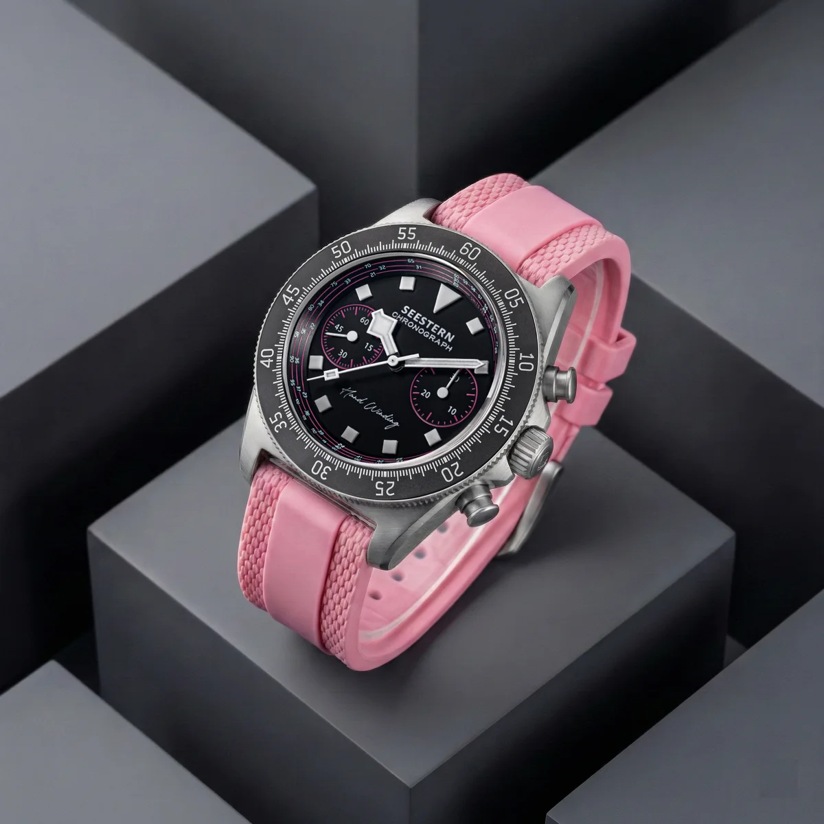 Pink chronograph watch with black dial and silver accents, perfect for active women.