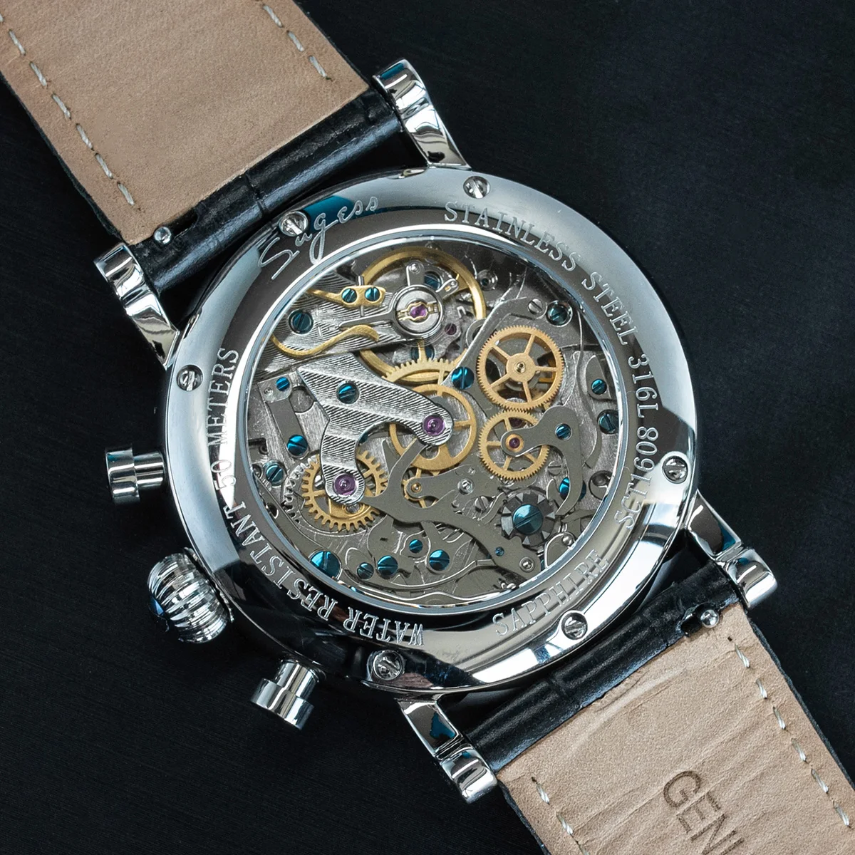 Luxury skeleton watch showcasing intricate mechanical movement and stainless steel case.