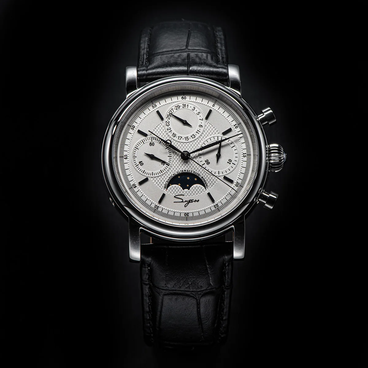 Elegant men's wristwatch with chronograph and moonphase features, black leather strap, silver case,.