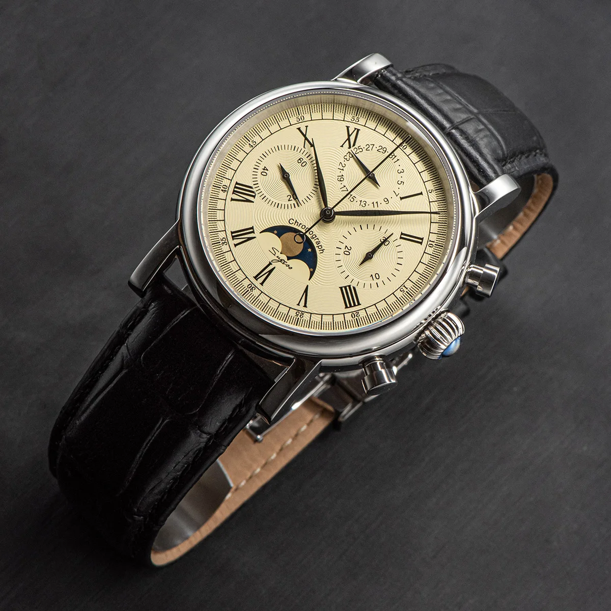 Elegant men's chronograph watch with black leather strap and cream dial. Perfect for formal and casu.