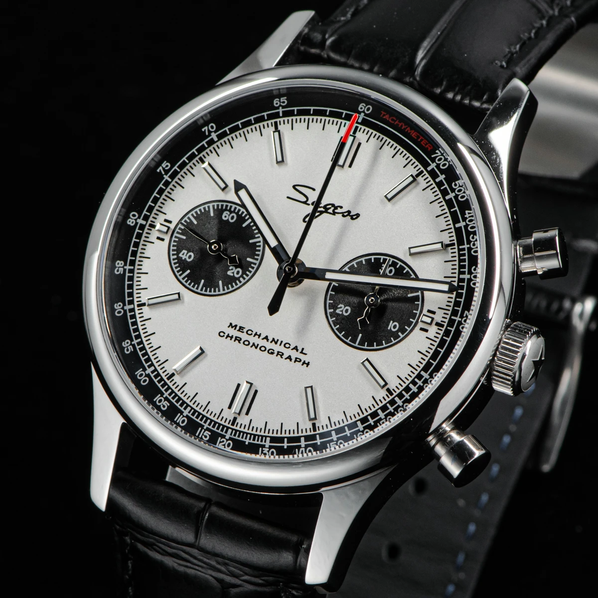 Men's luxury chronograph watch with black leather strap and silver dial for formal wear.