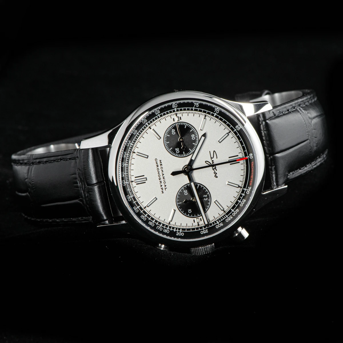 Luxury chronograph watch with black leather strap and silver dial, perfect for elegant jewelry acces.