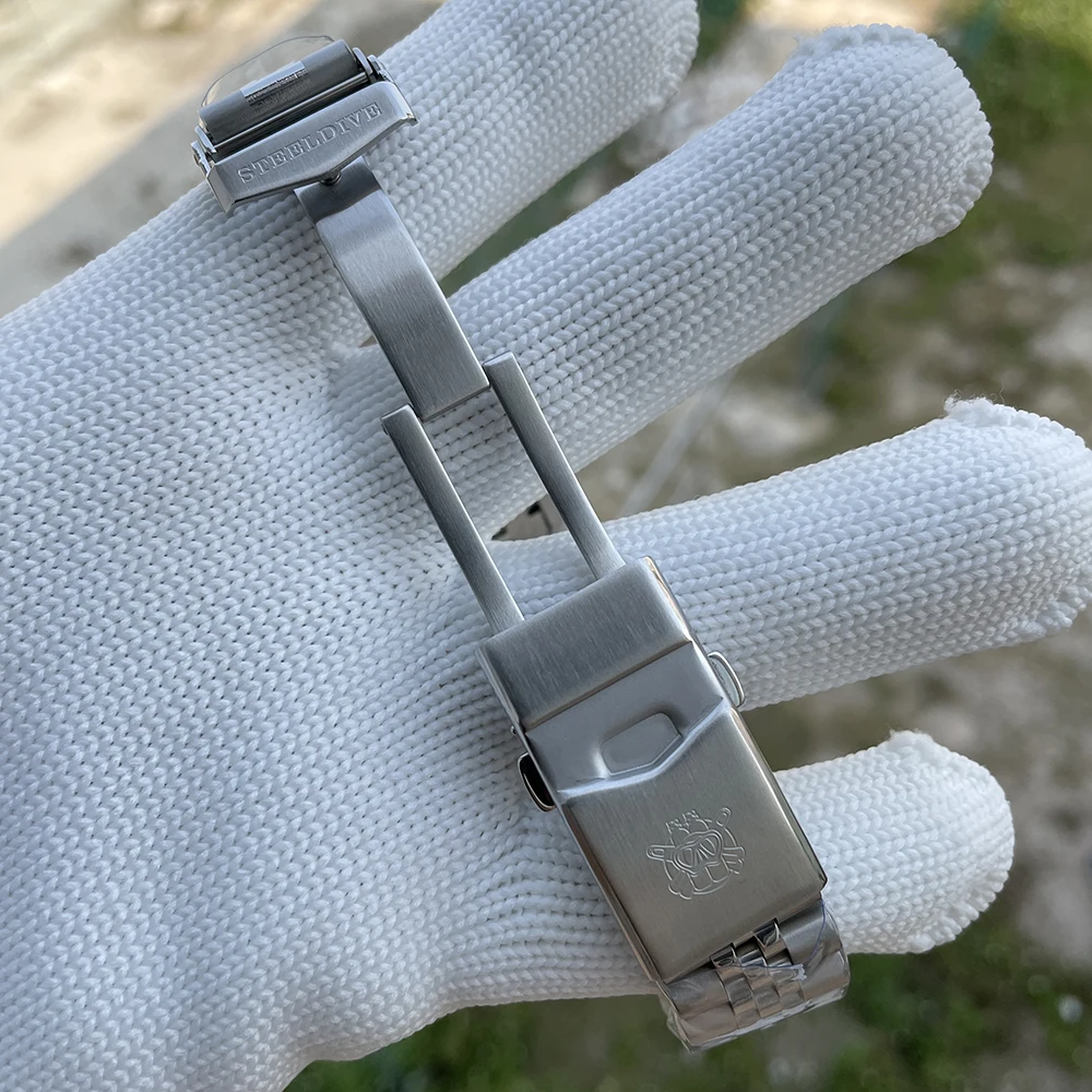 Stainless steel watch band with adjustable links for a perfect fit. Durable and stylish accessory fo.