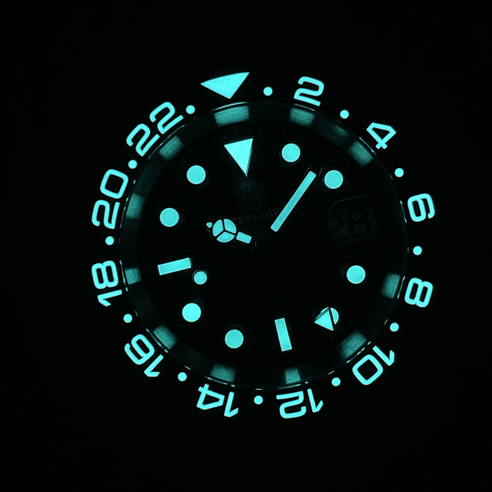 Luminous glow watch with glowing dial and bezel for night visibility.