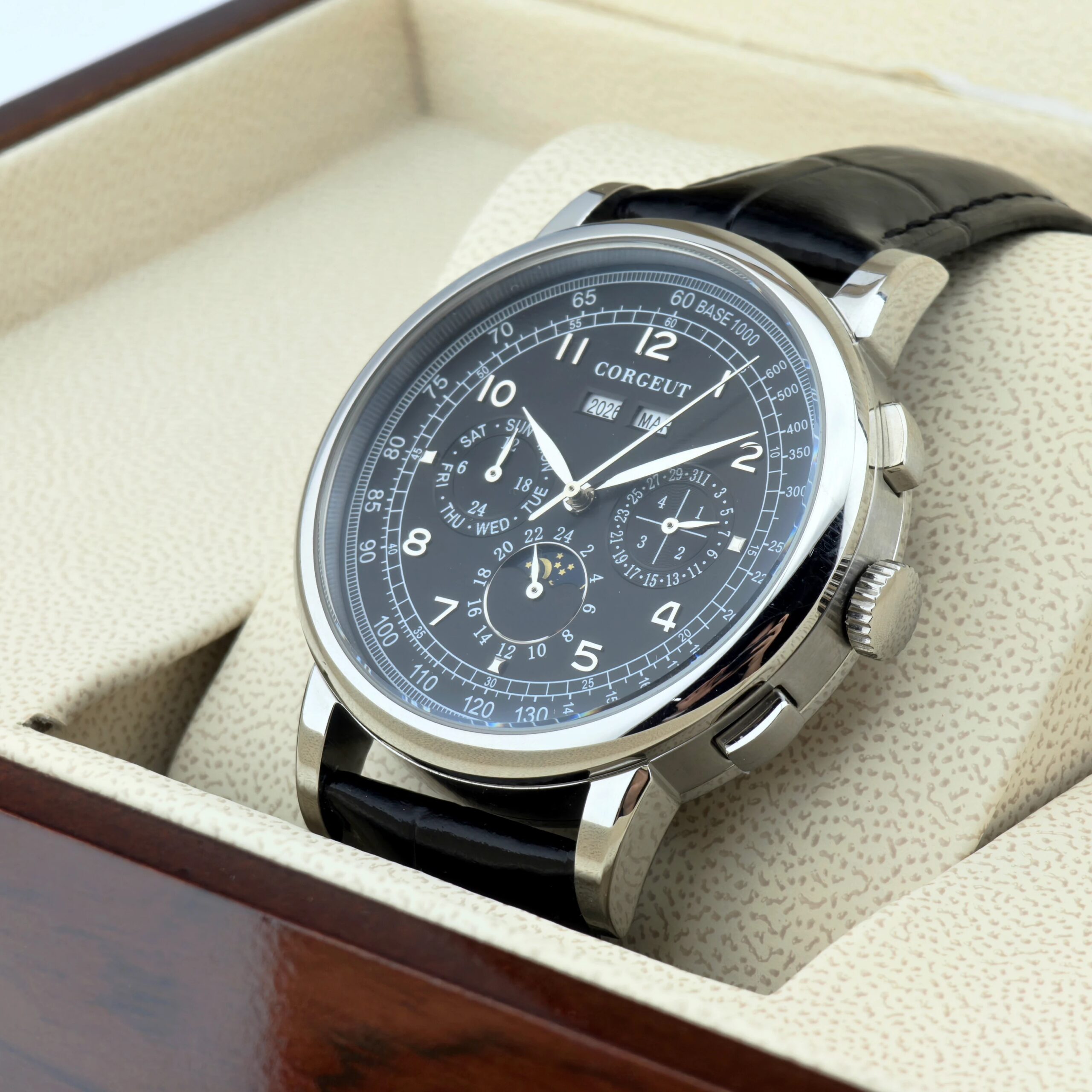 Men's luxury chronograph watch with black dial and leather strap in gift box.