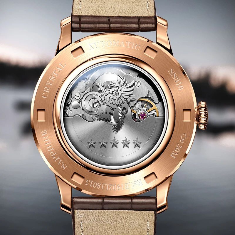 Automatic watch with dragon motif and visible movement, rose gold case, and leather strap.