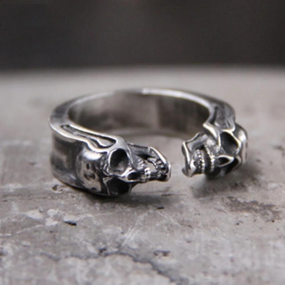 Silver skull and snake open band ring for men and women.